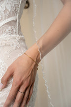 Close-up detail of the Ava cathedral wedding veil featuring large handcrafted glass crystal edging