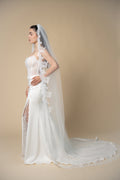 Beverly cathedral wedding veil featuring wide sequined eyelash lace handcrafted by Aoura Veil