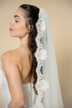 Side view of Bonnie cathedral bridal veil with floral lace trim