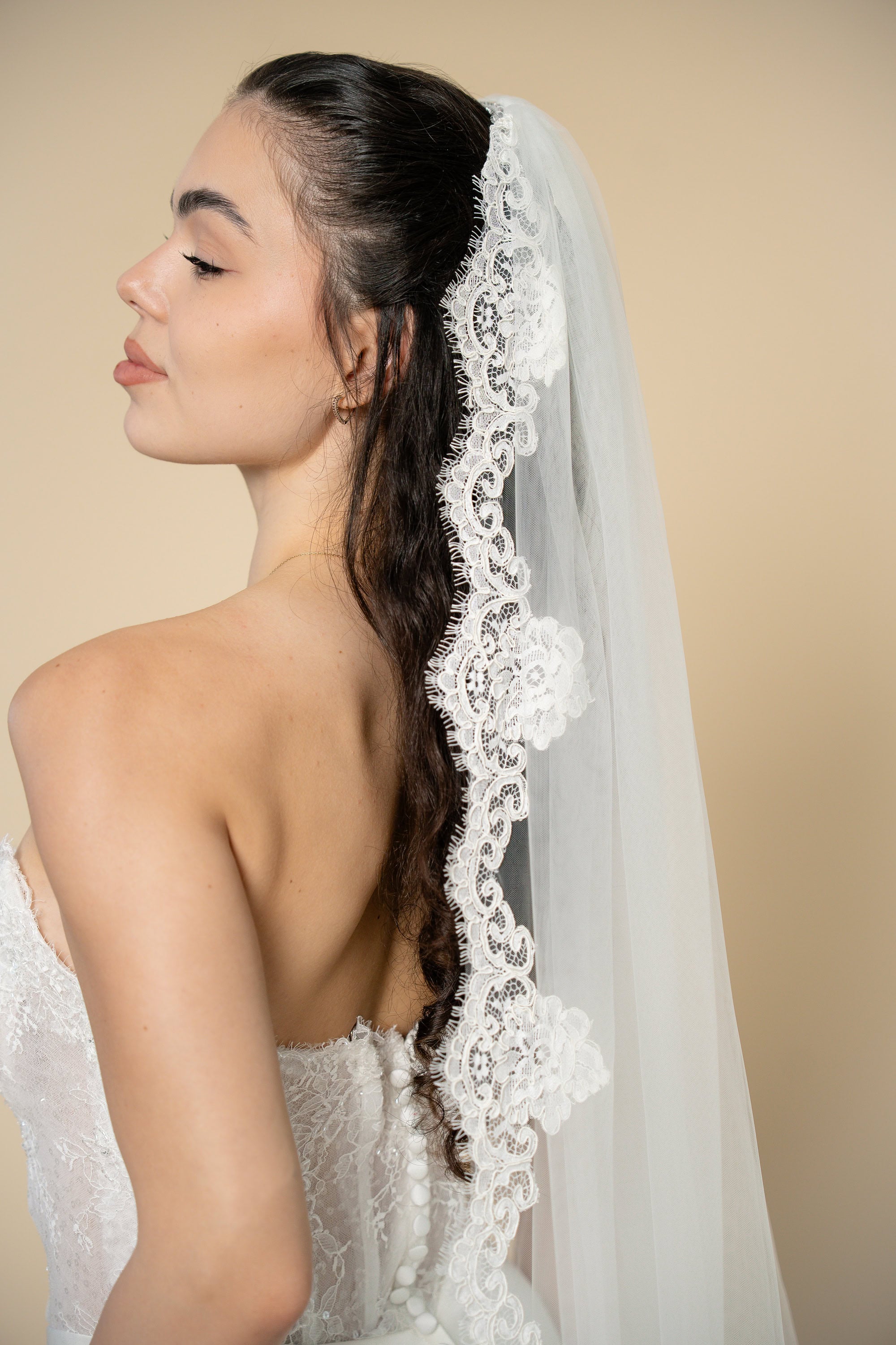 Side view of Bonnie cathedral bridal veil with floral lace trim