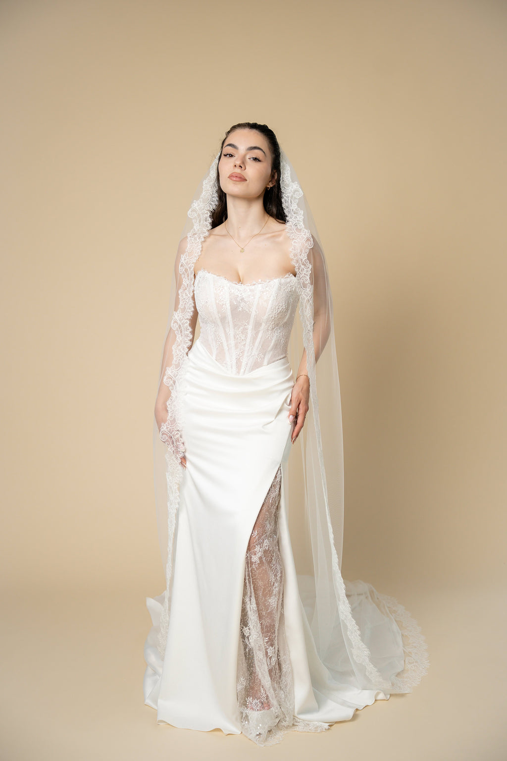 Diane cathedral wedding veil featuring floral eyelash lace handcrafted by Aoura Veil