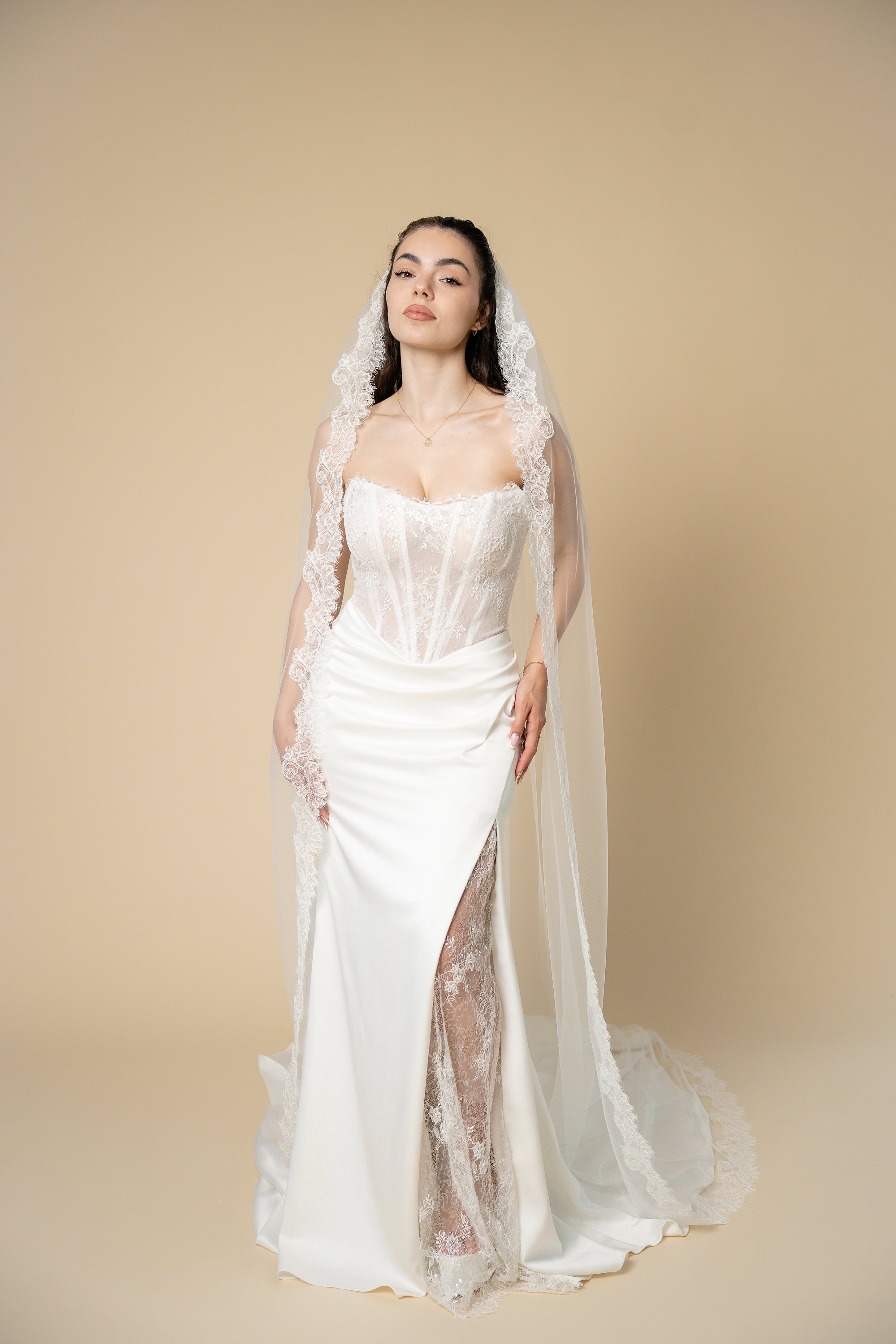 Diane cathedral wedding veil featuring floral eyelash lace handcrafted by Aoura Veil