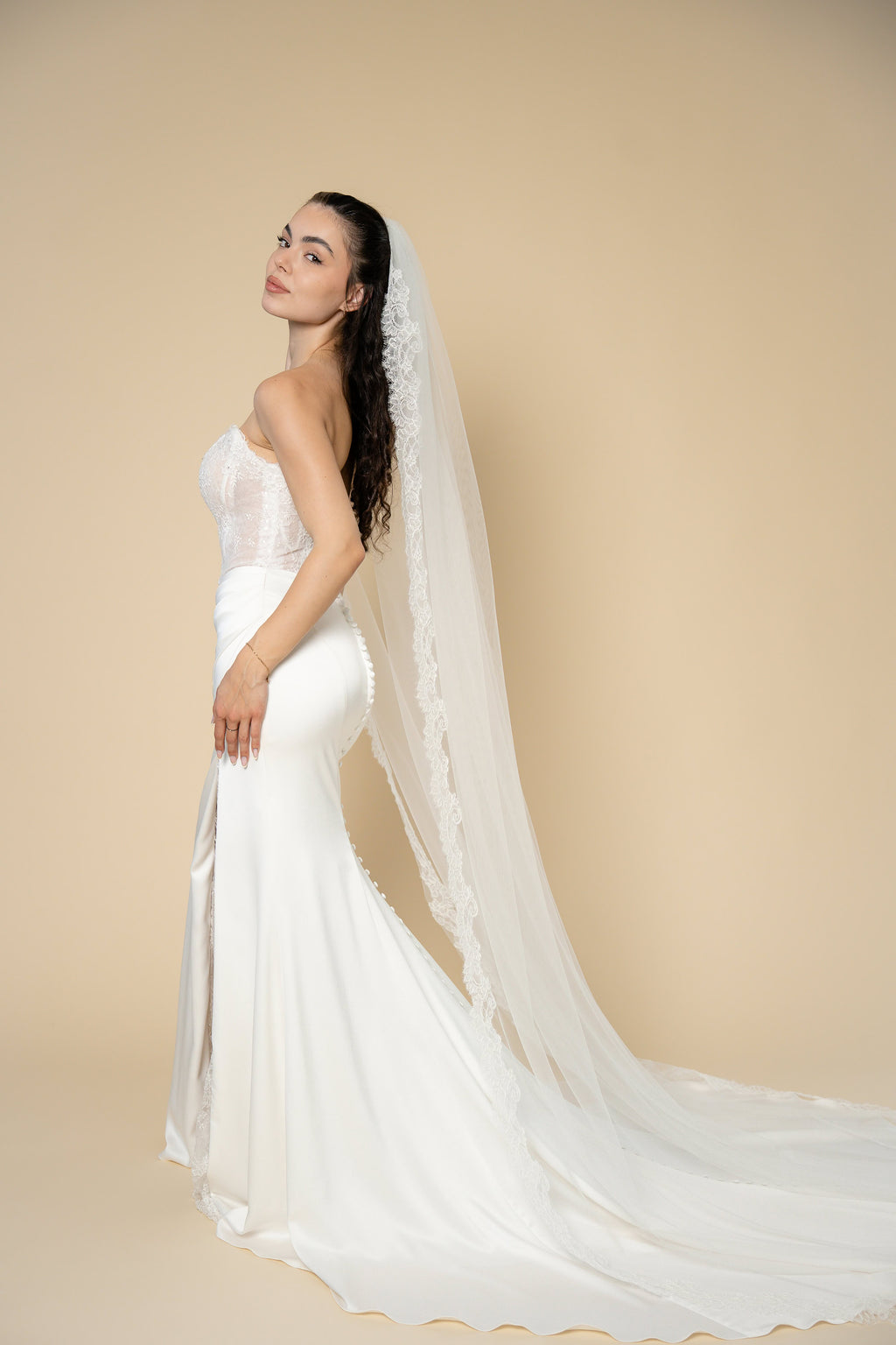Side view of Diane cathedral bridal veil with elegant floral eyelash lace border
