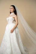 Side view of the Serena glitter cathedral wedding veil featuring delicate sparkle across the entire length by Aoura Veil